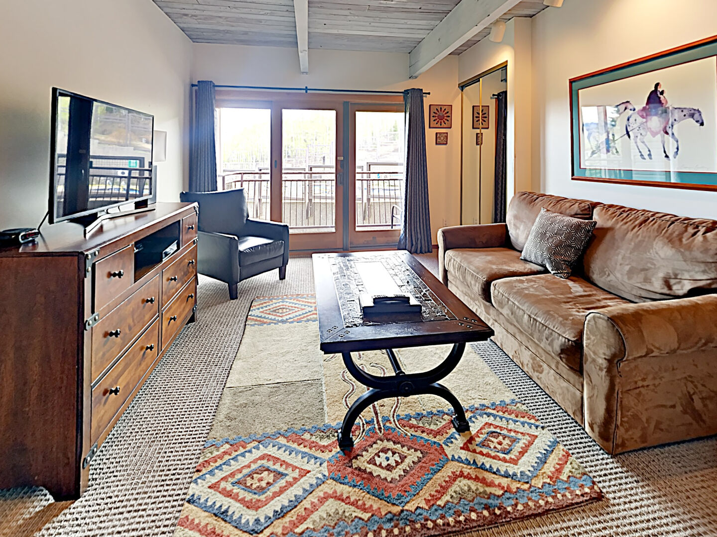 living room with couch and tv