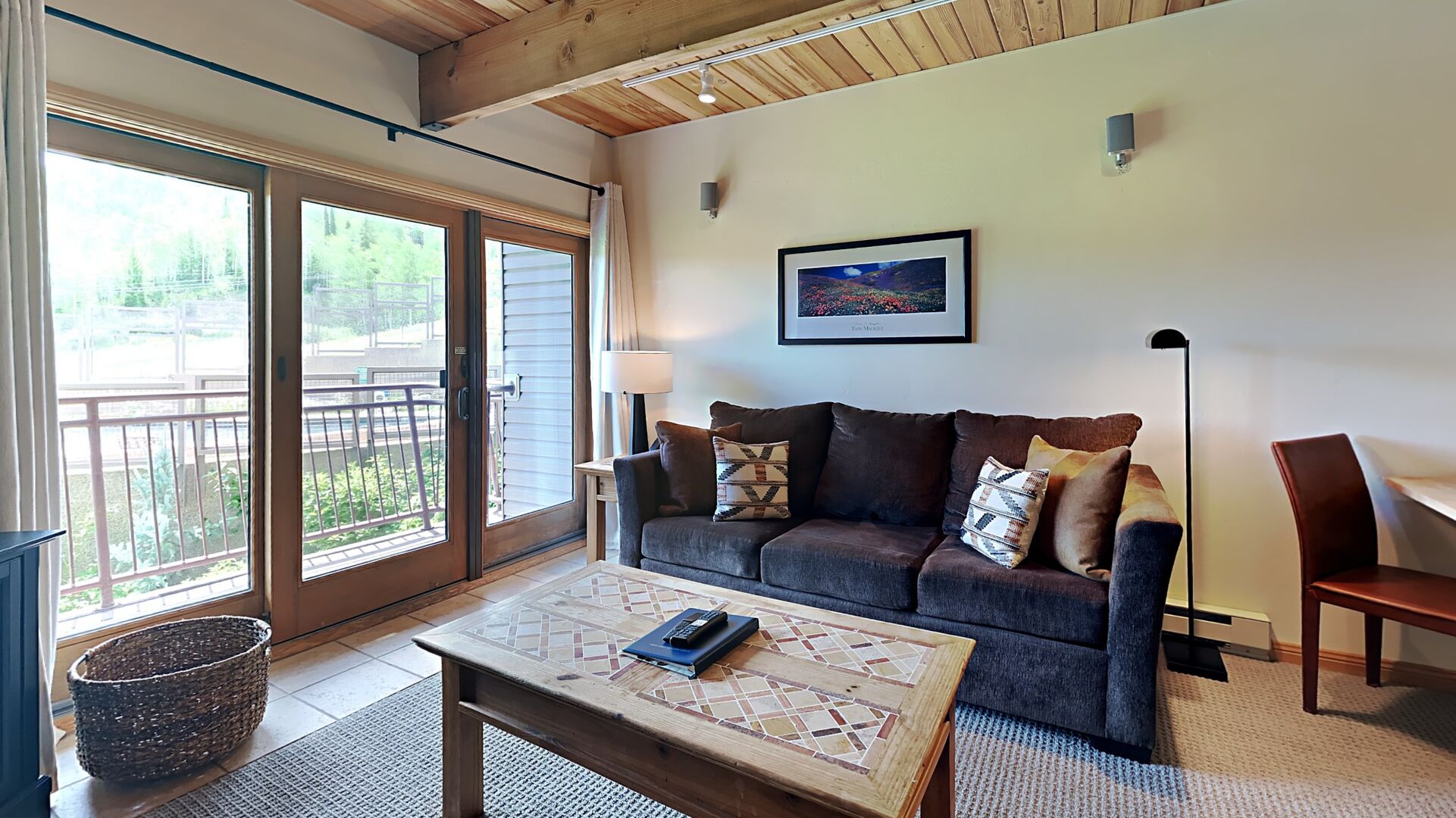 Th living room in one of our Snowmass rentals with a ping pong table